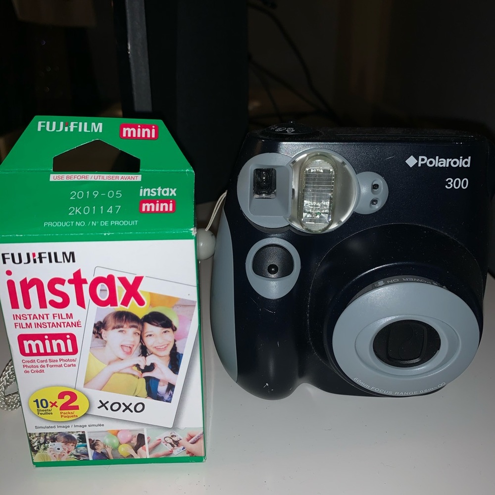 Polaroid camera w/ two packs of film